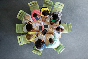 Students sitting at a table working together